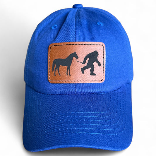 Sasquatch Bigfoot Walking A Horse Baseball Hat Multiple Colors
